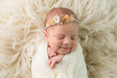 smiling-newborn-baby-girl