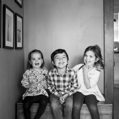 three kids laughing for some simple family portraits - photographed on 120 mm film on the Yashica Mat 124g