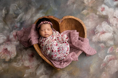 newborn photoshoot with a floral background