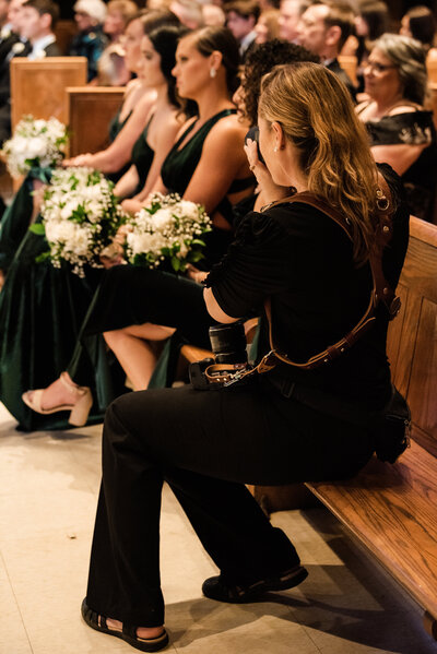 Maryland Wedding Photographer, Kimberly Dean shooting from a church pew at Loyola