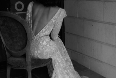 wedding dress with beaded floral lace and low open back