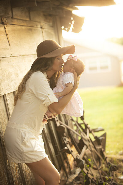 Mother and infant daughter at a Luscombe farm, photography by Dahlias and Daisies