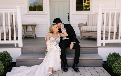Couple Sitting on Porch - Mikayla & Mario | Harmony Meadows Wedding - Lake Chelan Wedding