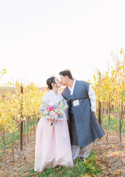 Bride and Groom in the vineyard at Stone Tower Winery in Leesburg, Virginia. Taken by Charlottesville Wedding Photographer Bethany Aubre Photography.