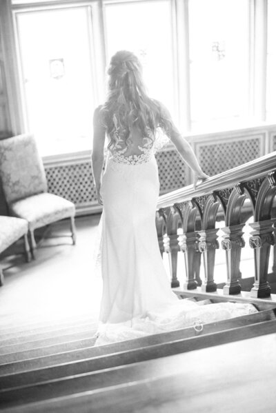 Bride walking down the stairs at Laurel Hall