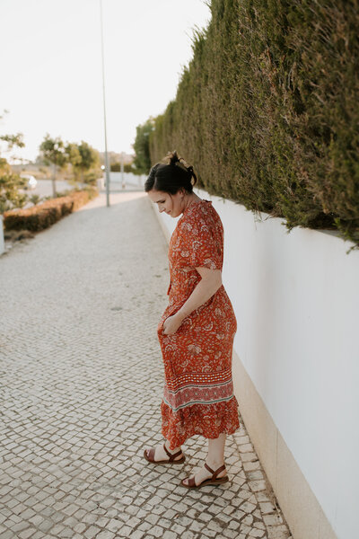 Portugl wedding photographer walking down the cobblestone streets near the beaches in Lagos, Portugal