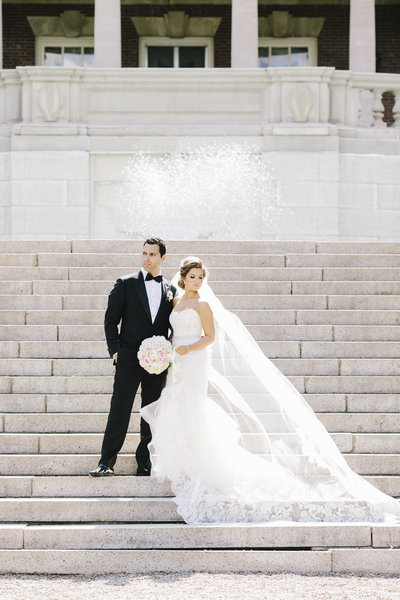 married couple stand on fairleigh dickinson university  steps