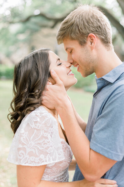 A gorgeous couple kissing during their Savannah, Georgia engagement photos