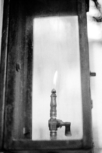 Black and white film photograph of gas light in downtown Charleston South Carolina