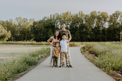 PIcture of Jerusha Jantz, her husband, and two boys. 
