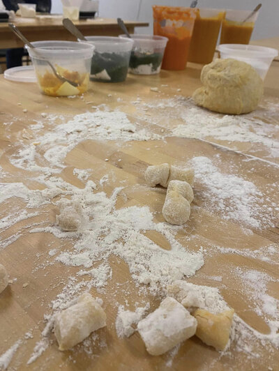 Ingredients for gnocchi laid out on table