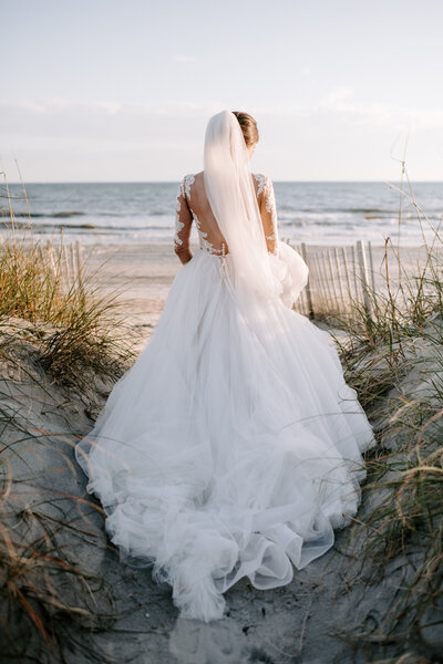bride looking away at ocean