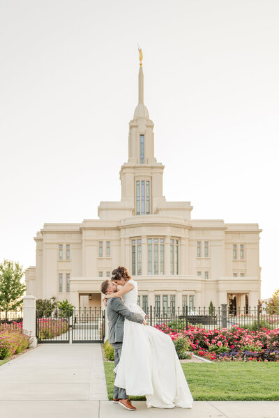 bride and groom wedding portraits payson utah temple at sunset