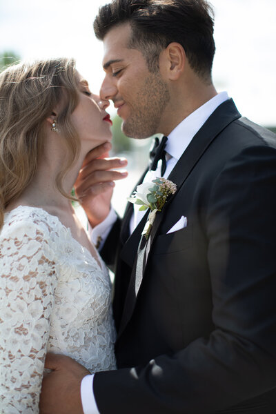 bride and groom kissing on their wedding day