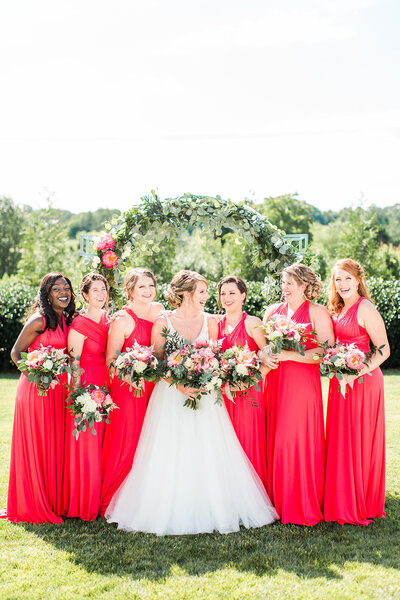 bride with colorful bridal party