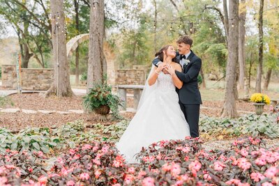Newlyweds Mark and Emily underneath Carrigan Farms' willow tree captured by Charlotte NC wedding photographer