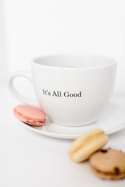 A coffee mug with the text it's all good stock image photography for the bookkeeping template for creatives by Dolly DeLong Education