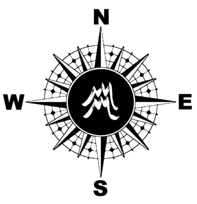 Creative Direction black and white compass with MM logo