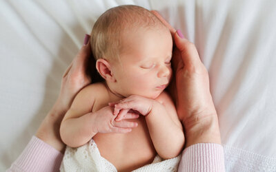 Vanessa captures beautiful newborn portraits in the comfort of your home
