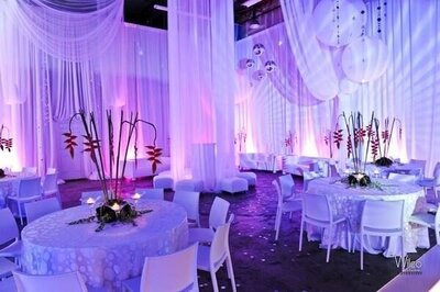 purple light in room with wedding set-up