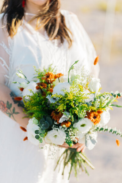 bright bouquet held by a bride