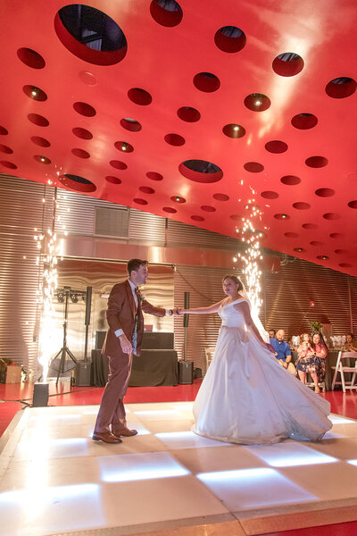 bride and groom first dance with cold spark machines
