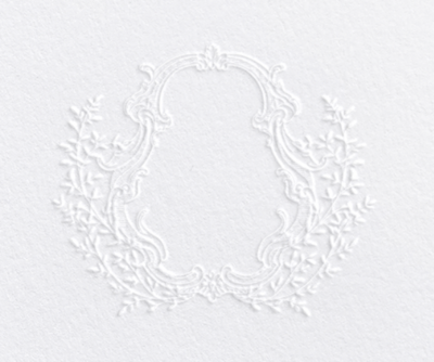 Embossed crest on cotton paper