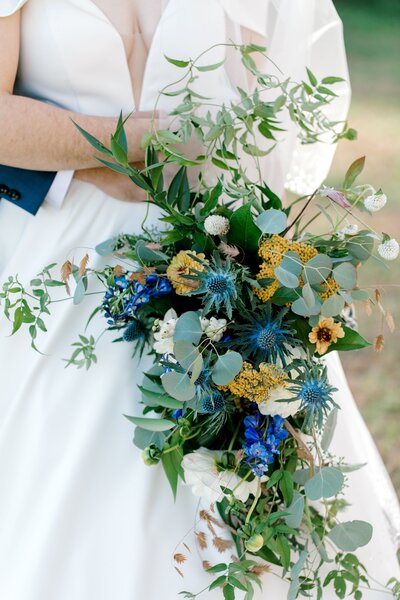 Leigh Florist Design Studio shades of blues cascade bouquet