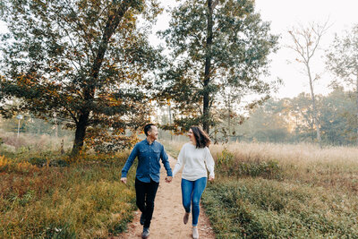 couple running in a photo for their engagement session