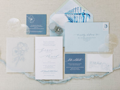 Light and airy wedding invitation suite with custom calligraphy