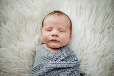 newborn baby boy at an in home session in Lewisville, TX