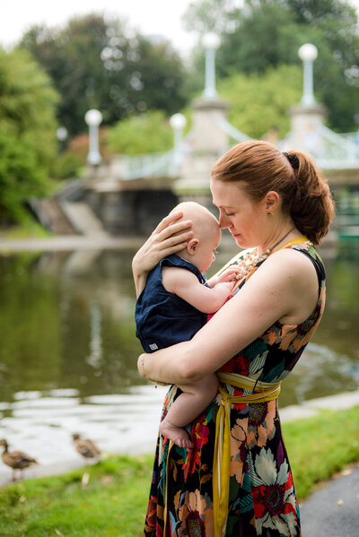 mother holding her son at the Boston Public Garden