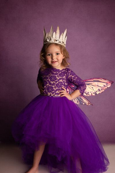 girl-with-fairy-wings-in-purple-dress