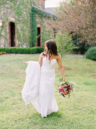 Bride walking with her wedding bouquet for bridal photography