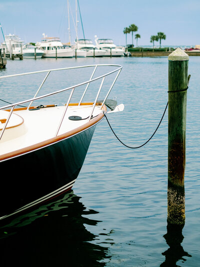 Sailboat docked outside the Longboat Key Club during a coastal Florida wedding.