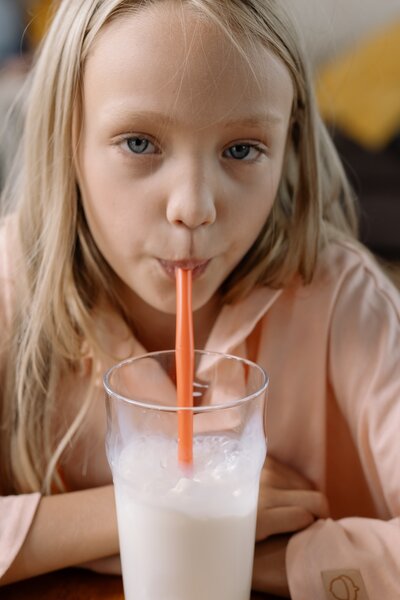 Girl drinking a smoothie