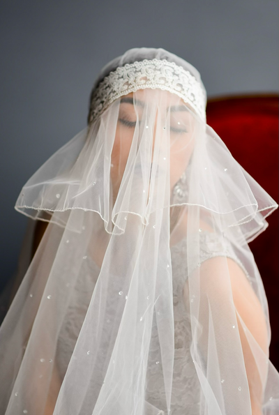 Sepulveda Home bride wearing custom veil by Rafaela Chapel Veils