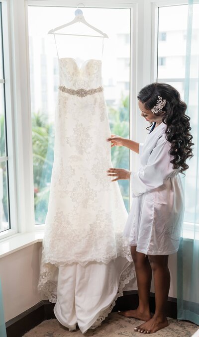Bride with her wedding dress, at Destination Wedding at The Palms Hotel in Miami, FL