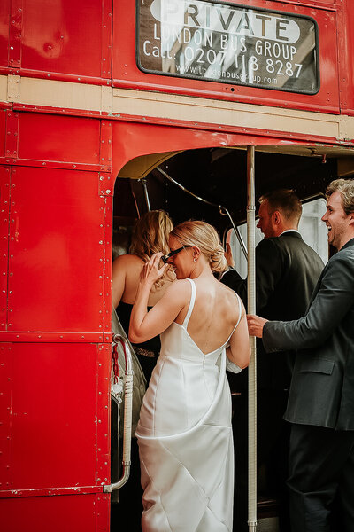 Editorial style photo of Bride boarding  routemaster bus