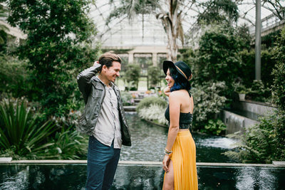Stylish couple photographed inside Longwood Gardens.