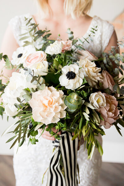 Affordable Washington elopement photographer captures bride holding bridal bouquet