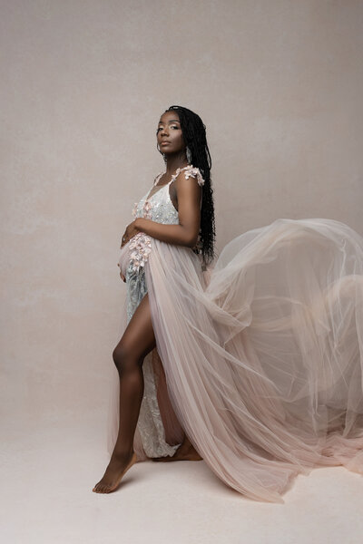 Pregnant woman wearing extravagant dress, taken by new jersey maternity photographer Ally Kimpton Photography