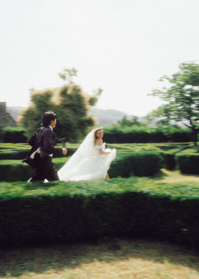 Timeless beauty of a stylish bride, gracefully posing in her gown, embodying elegance and sophistication in a dreamy wedding atmosphere