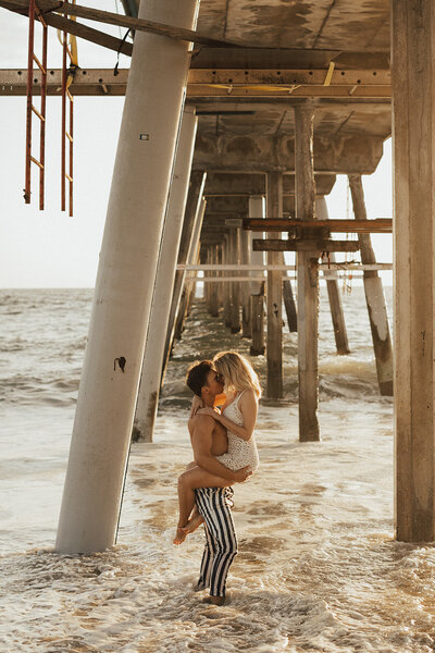 Romantic beach engagement photography at sunset