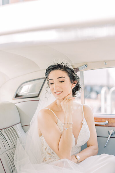 bride sitting in a limo