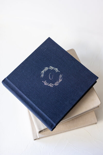 navy blue photo album with custom embossing on cover