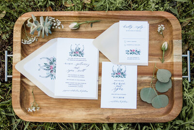 Horse themed wedding invitations with hand painted watercolor horseshoe crest