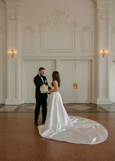 The bride and groom shared a first look in the ballroom of the Mayo Hotel in Tulsa Oklahoma