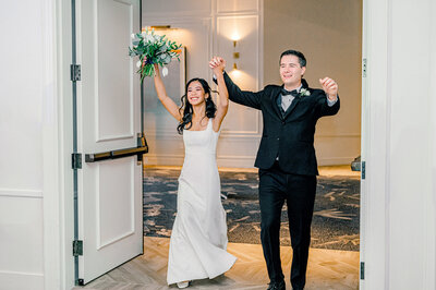 grand entrance of the bride and groom at The Kimpton Cottonwood Hotel