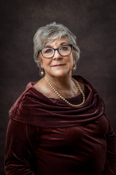 Portrait of a breast cancer survivor smiling with strength and confidence